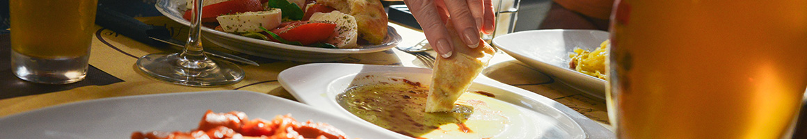 Eating Greek Mediterranean at Taverna Plaka restaurant in Atlanta, GA.